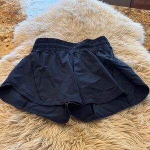 Lululemon Women’s 5” shorts. Navy blue color size 4. Built in liner like new!